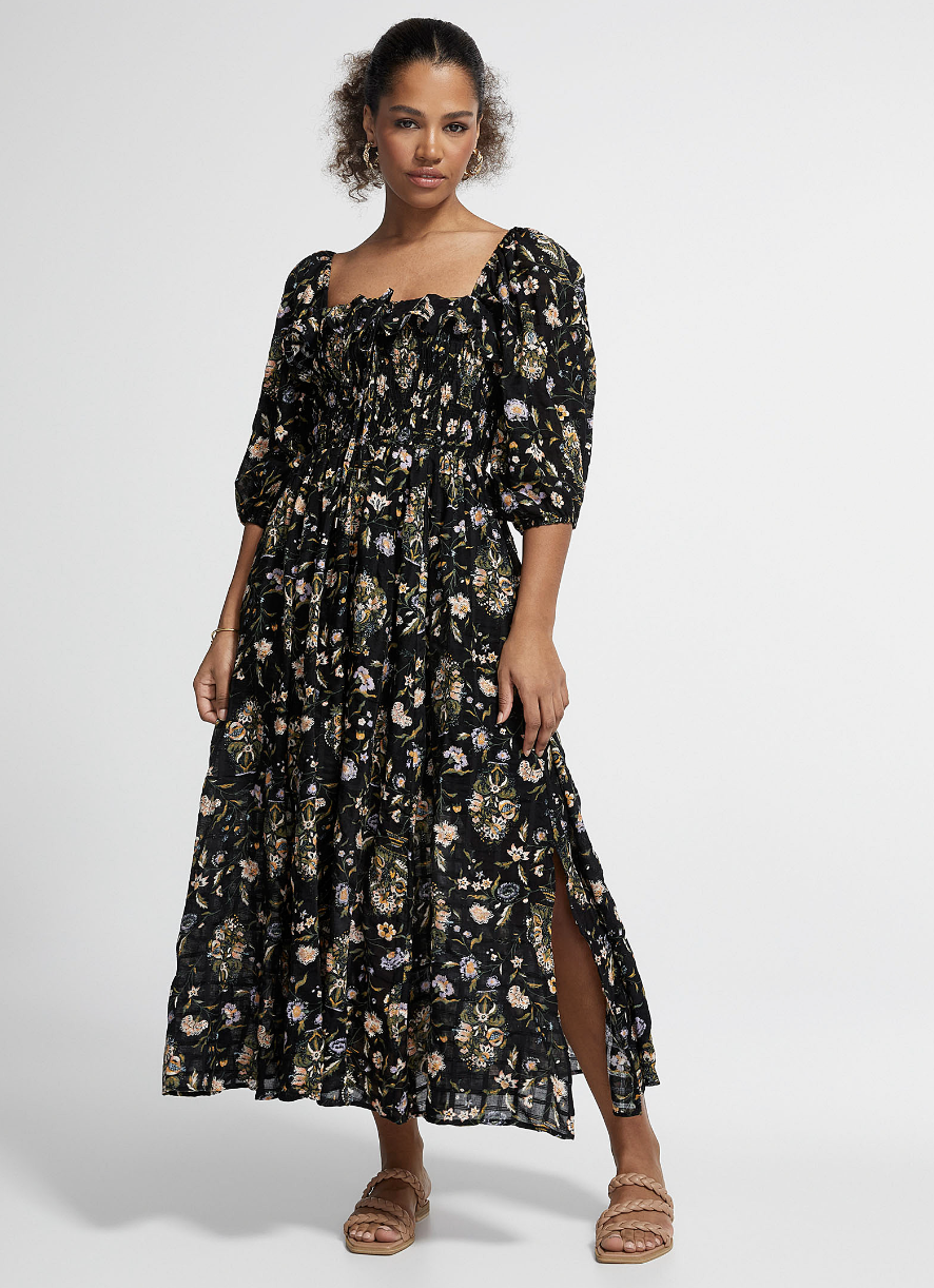 model wearing black floral Free People Oasis Long Night Garden Dress  with sleeves (photo via Simons)