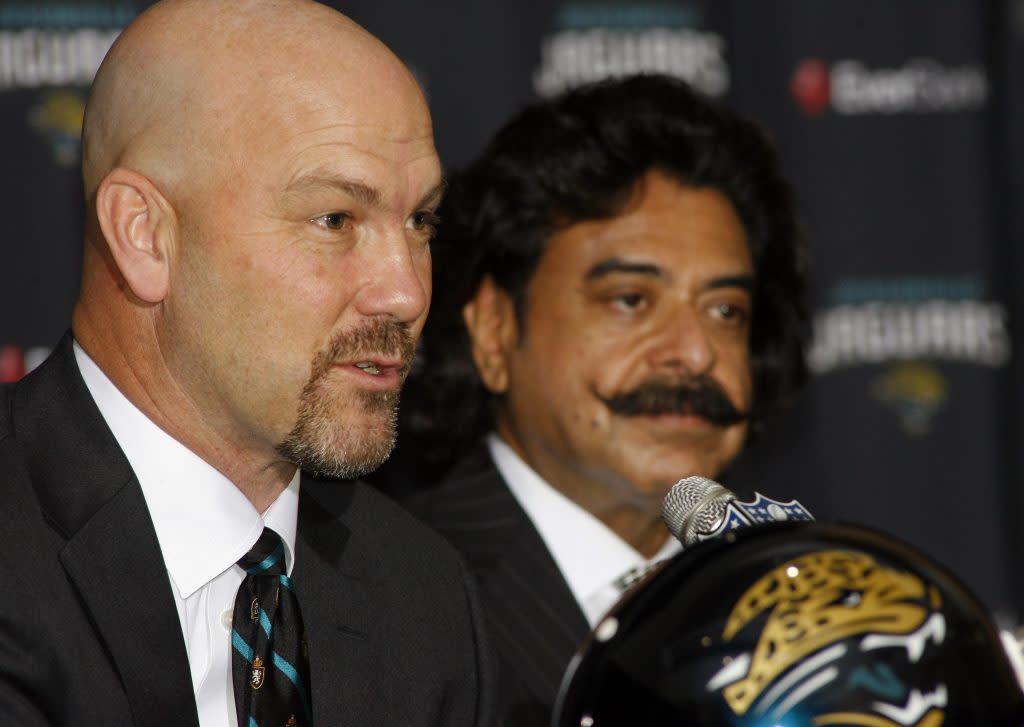 Jan 18, 2013; Jacksonville FL, USA; Jacksonville Jaguars new head coach Gus Bradley speaks as owner Shad Khan listens at a press conference at EverBank Field. Mandatory Credit: Phil Sears-USA TODAY Sports