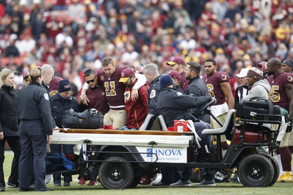 Alex Smith suffered a brutal broken leg in Sunday’s loss to Houston. Perhaps his only consolation is that he had quite a financial safety net in the form of $71 million. (Getty Images)