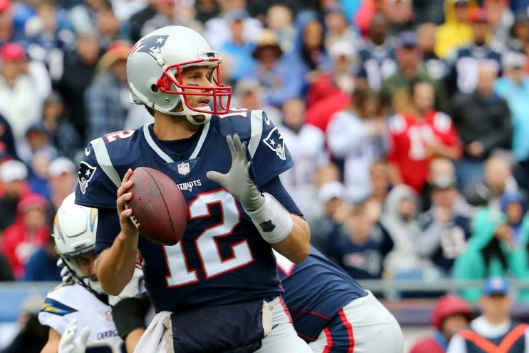 Tom Brady of the New England Patriots looks for a pass during the first half against the Los Angeles Chargers, at Gillette Stadium in Foxboro, Massachusetts, on October 29, 2017