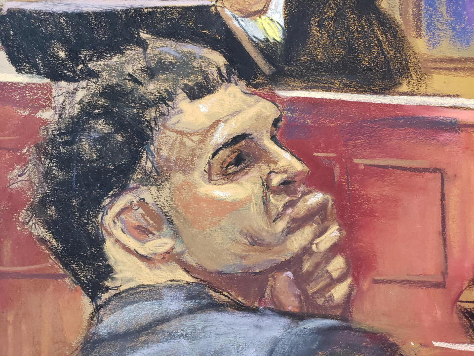 Caroline Ellison is questioned as Sam Bankman-Fried watches during his fraud trial before U.S. District Judge Lewis Kaplan over the collapse of FTX, the bankrupt cryptocurrency exchange, at Federal Court in New York City, U.S., October 11, 2023 in this courtroom sketch. REUTERS/Jane Rosenberg