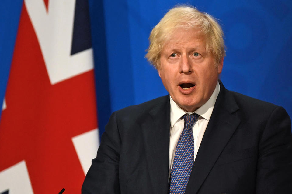 Britain's prime Minister Boris Johnson gives an update on relaxing restrictions imposed on the country during the COVID-19 pandemic at a Downing Street Briefing Room in central London on 12 July. Photo: Daniel Leal-Olivas/Pool/AFP via Getty 