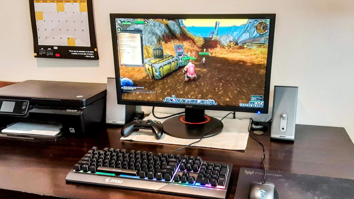 Acer XFA240 on a desk