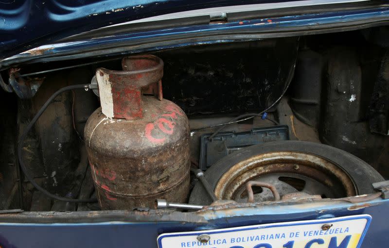 A cooking gas canister is pictured at the trunk of a car, that runs with cooking gas instead of fuel, as Venezuelans struggling to cope with chronic fuel shortage, in Maracaibo