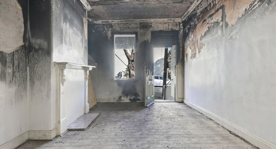 Inside of a fire-bombed home on Campbell Street, Glebe in Sydney.