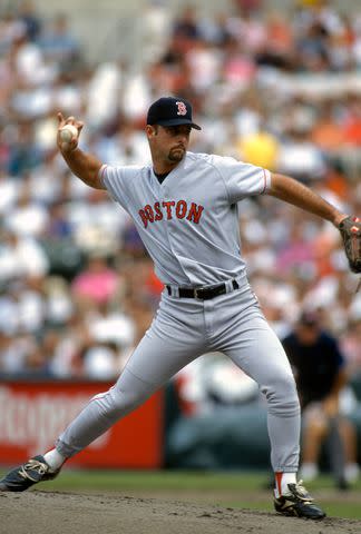 <p>Focus on Sport/Getty</p> Tim Wakefield pitches for the Boston Red Sox in 1996.