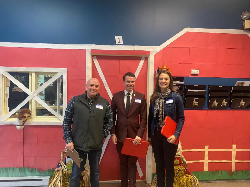The celebrity judges for MOC Head Start and Child Care's recent Literacy Door Decoration Contest. From left: MOC Maintenance Director Rick McCarthy, Mayor Michael Nicholson, and City Council President Elizabeth Kazinskas.
