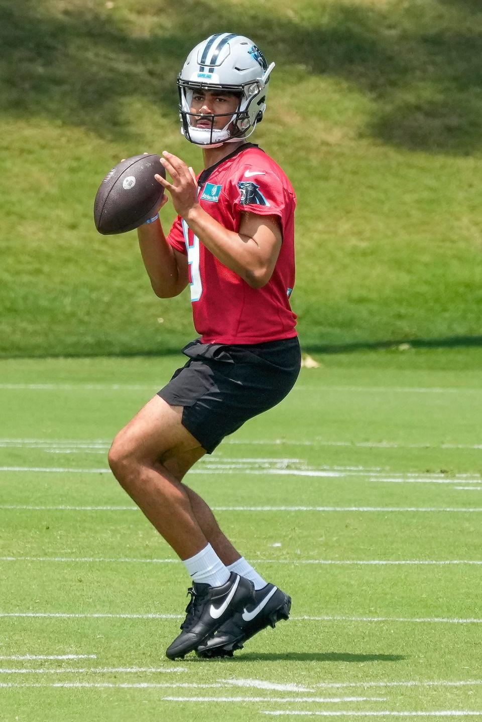 Carolina Panthers quarterback Bryce Young (9) drops back to pass during rookie camp at the Atrium Practice Facility in Charlotte, North Carolina.