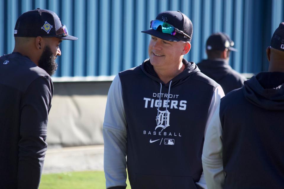 Detroit Tigers manager AJ Hinch talks to outfielder Derek Hill on spring training report date Sunday, March 13, 2022, in Lakeland, Florida.