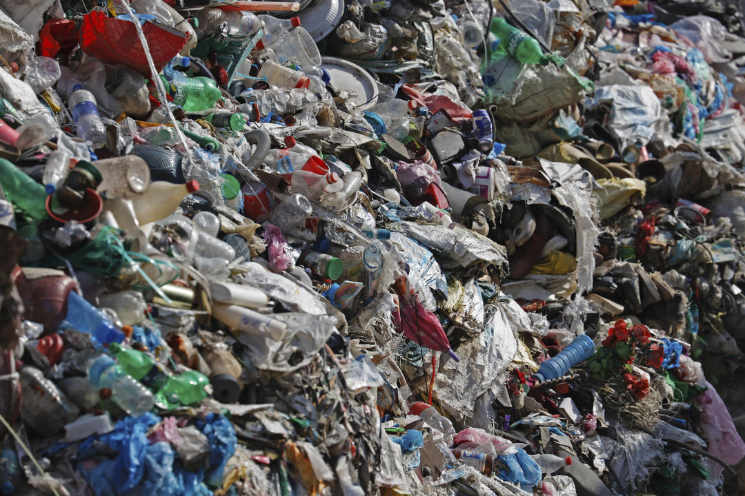 Garbage collected en route Mount Everest is piled before it is sorted for recycling at a facility operated by Agni Ventures, an agency that manages recyclable waste, in Kathmandu, Nepal, Monday, June 24, 2024. The highest camp on the world's tallest mountain is littered with garbage that is going to take years to clean up, according to a Sherpa who led a team that worked to clear trash and dig up dead bodies frozen for years near Mount Everest's peak. (AP Photo/Sanjog Manandhar)