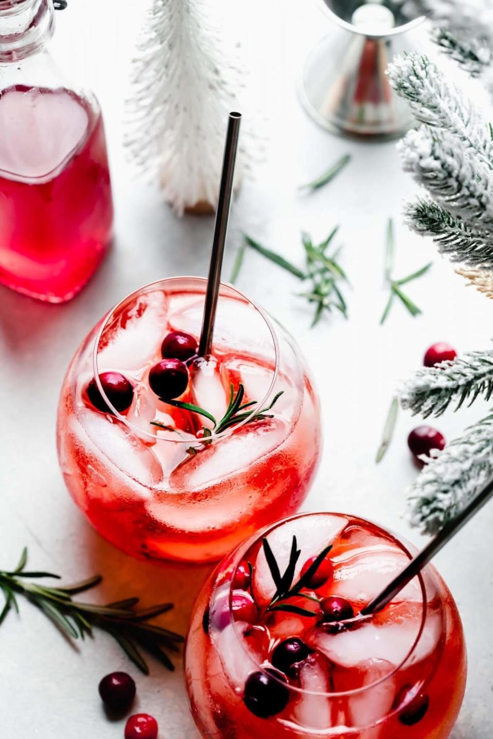 Two winter Aperol spritzes in glasses.