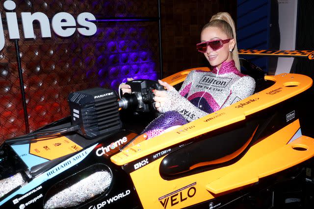 <p>Rich Polk/Getty</p> Paris Hilton at Las Vegas Grand Prix event