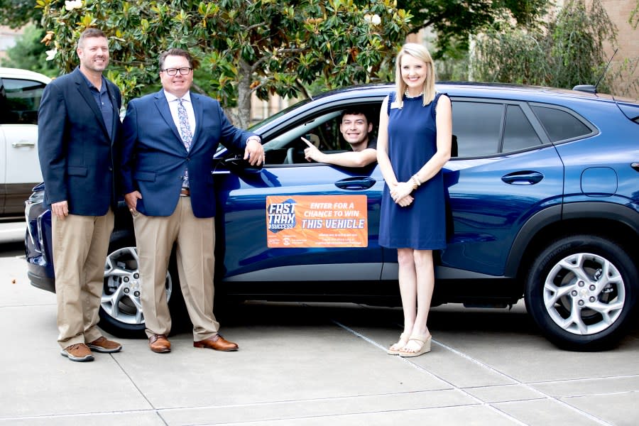 (L-R) Dr. Michael Simon, J.J. Weibe, Isaac Estrada and Krista Brown, with the awarded car, courtesy of Angelina College