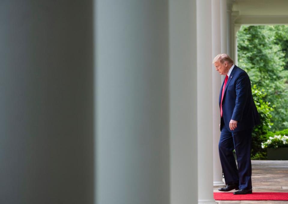 Donald Trump enters the Rose Garden at the White House for a press briefing on 29 May.