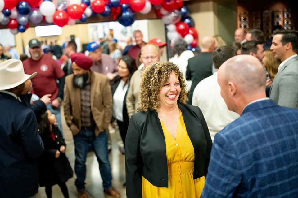 Celeste Maloy talks with Gov. Spencer Cox at an election night party at the Utah Trucking Association in West Valley City on Tuesday, Nov. 21, 2023. Maloy is running against Democratic state Sen. Kathleen Riebe, D-Cottonwood Heights, in the special election to fill Rep. Chris Stewart’s seat in the 2nd Congressional District. | Spenser Heaps, Deseret News