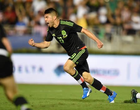 Oct 10, 2015; Pasadena, CA, USA; Mexico forward Oribe Peralta (19) celebrates after scoring a goal in overtime against the United States in CONCACAF Cup match at Rose Bowl. Mandatory Credit: Kirby Lee-USA TODAY Sports