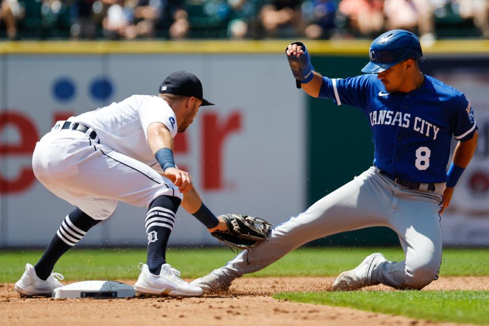 Detroit Tigers second baseman Kody Clemens (21) tags out Kansas City Royals second baseman Nicky Lopez (8) trying to steal second in the second inning at Comerica Park.