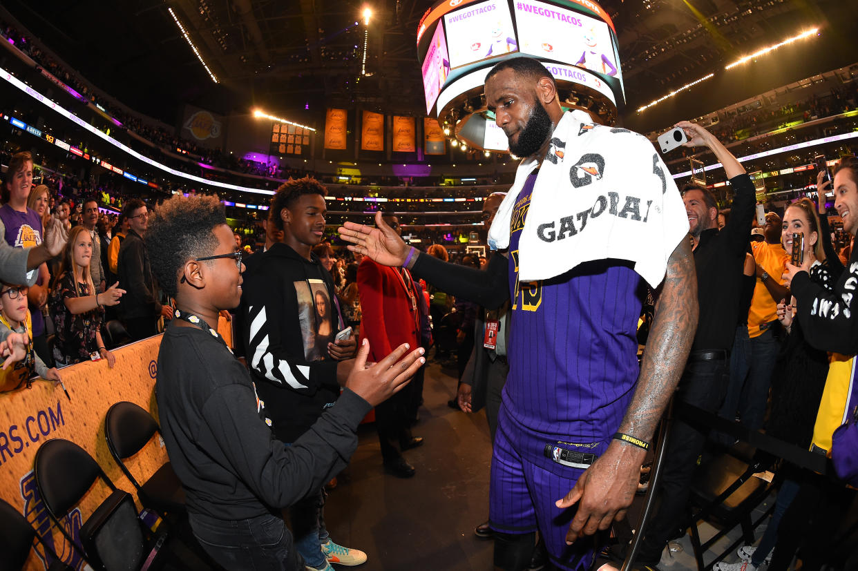 LeBron James had just the right words to say to his son, Bryce, after Bryce’s team staged a comeback win. (Photo by Andrew D. Bernstein/NBAE via Getty Images)