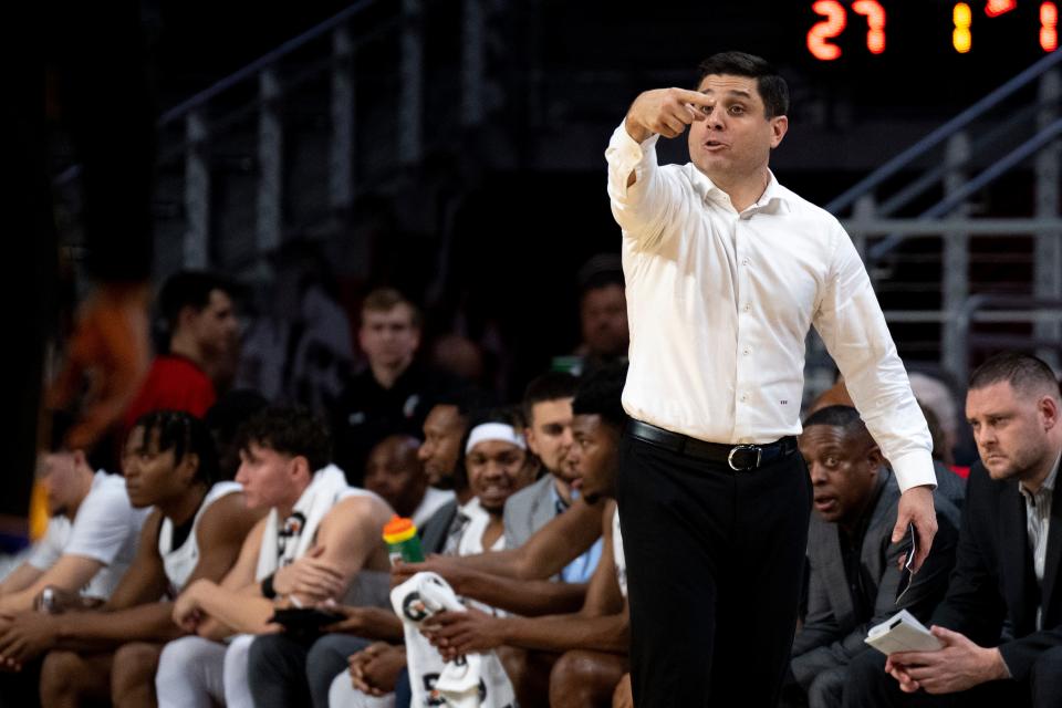 Cincinnati head coach Wes Miller directs his team, Wednesday, Jan. 11, 2023.