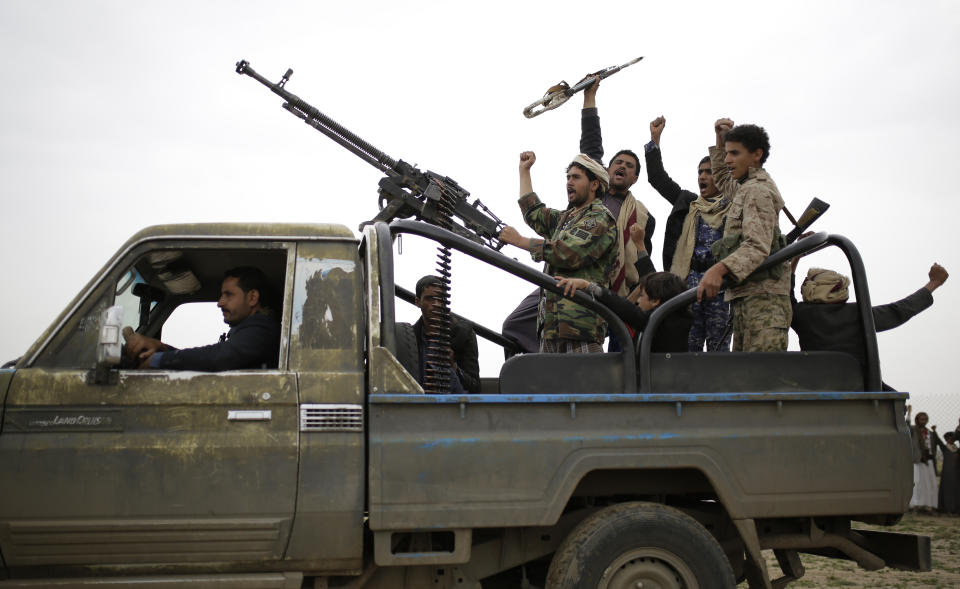 Houthi rebels fighters chant slogans as they take off to a battlefront following a gathering aimed at mobilizing more fighters for the Houthi movement, in Sanaa, Yemen, Thursday, Aug. 1, 2019. The conflict in Yemen began with the 2014 takeover of Sanaa by the Houthis, who drove out the internationally recognized government. Months later, in March 2015, a Saudi-led coalition launched its air campaign to prevent the rebels from overrunning the country's south. (AP Photo/Hani Mohammed)