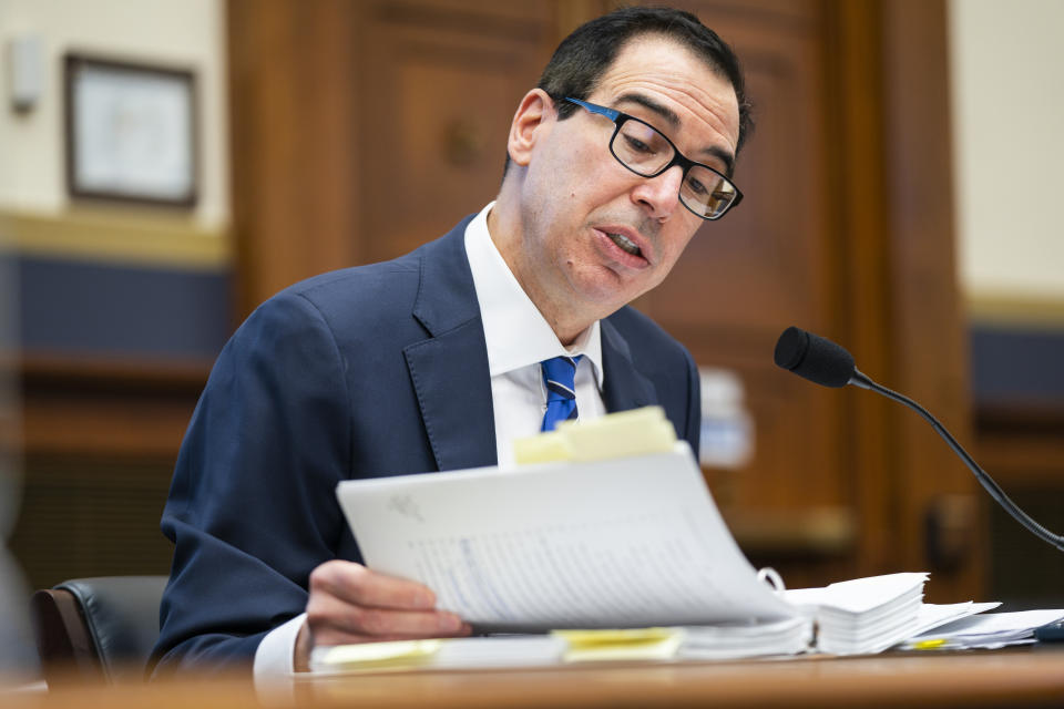 Treasury Secretary Steven Mnuchin testifies before a House Financial Services Committee hearing on Capitol Hill in Washington, Wednesday, Dec. 2, 2020. (Jim Lo Scalzo/Pool via AP)