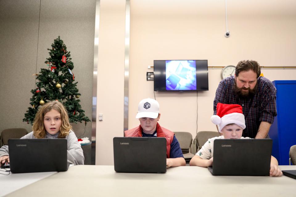 Students participate in the Independence Public Library's Youth Coding League on Dec. 11.