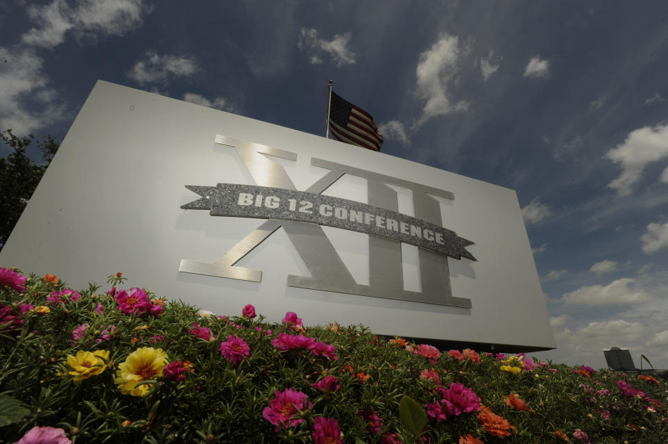 FILE - In this June 14, 2010, file photo, a Big 12 sign is seen outside the conference headquarters in Irving, Texas. The coronavirus pandemic has shuttered sports at all levels, but all Big 12 schools expect their campuses to be open in the fall, lending hope to the possibility that football can start on time. (AP Photo/Cody Duty, File)