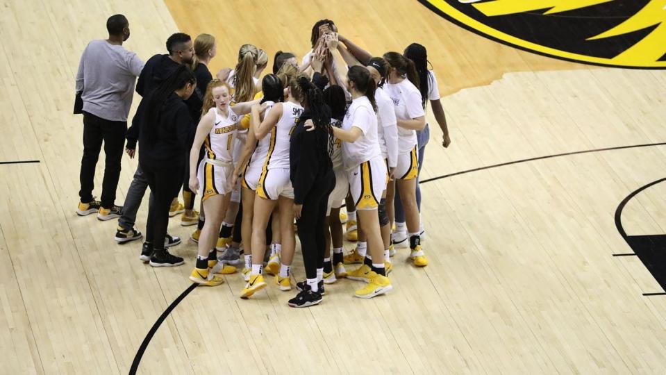 Missouri women's basketball gathers near its bench after a timeout at Mizzou Arena.