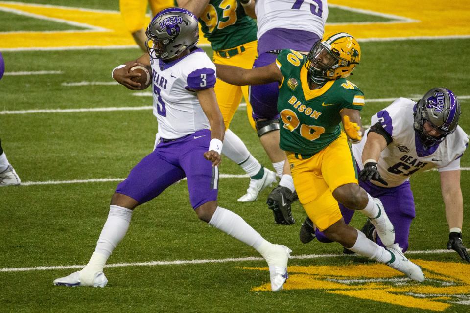 Former North Dakota State defensive lineman Tony Pierce, right, has committed to Colorado State.