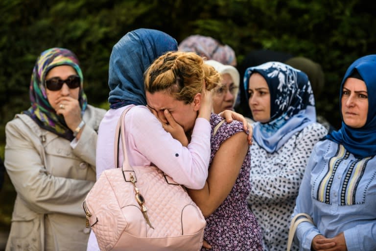 Relatives of suicide attack victim Mohammad Eymen Demirci mourn on June 29, 2016 in Istanbul during his funeral a day after a suicide bombing and gun attack targeted Istanbul's Ataturk airport, killing 41 people