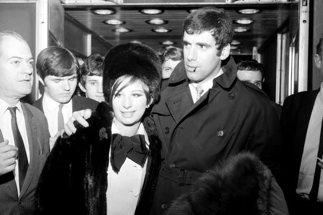 <p>Harry Dempster/Express/Getty</p> Barbra Streisand (left) and Elliot Gould photographed in London on March 17, 1966