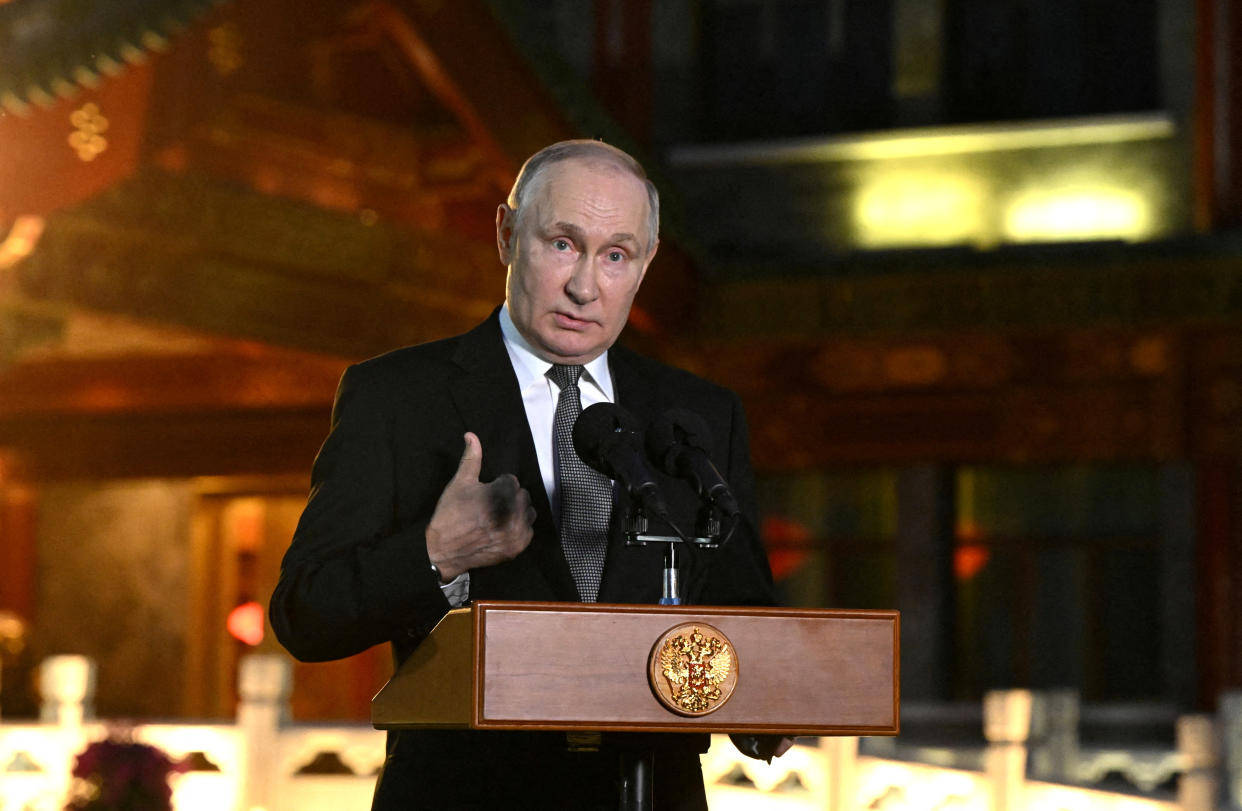 Russian President Vladimir Putin speaks at a press conference in Beijing on Oct. 18. 
