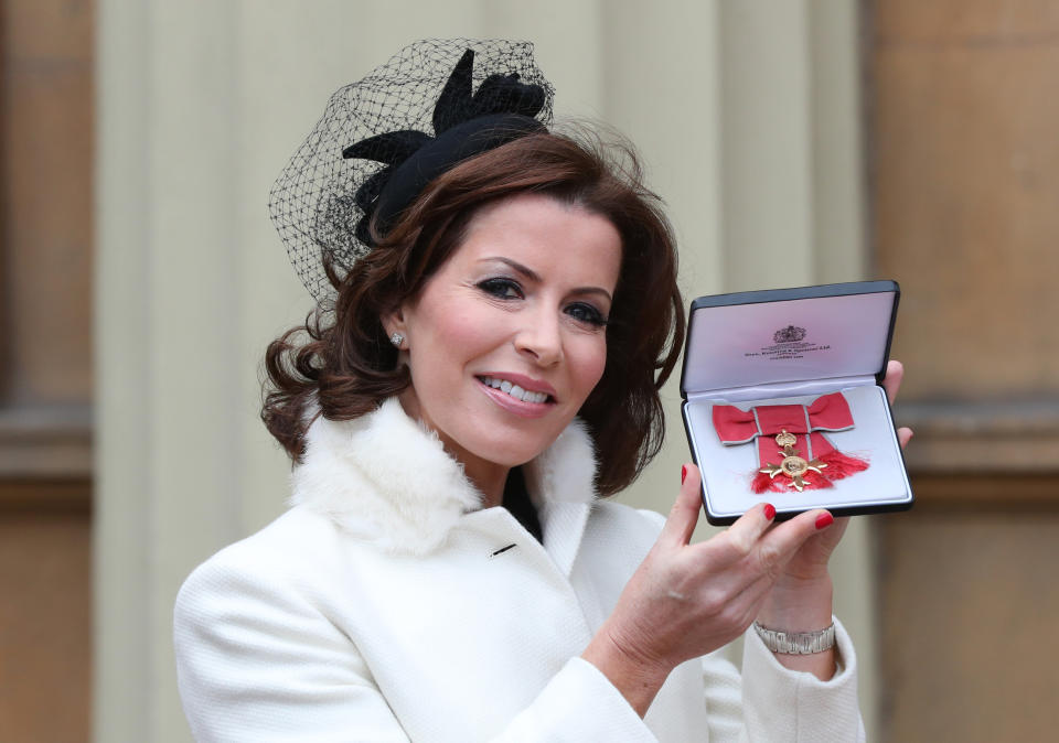 Natasha Kaplinsky received her OBE from the then Prince of Wales at Buckingham Palace.