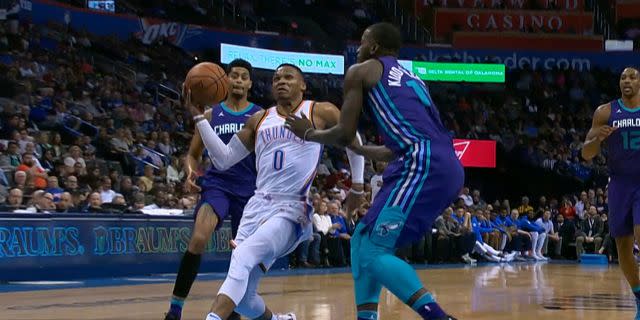 Russell Westbrook had no regard for Marvin Williams’ life as he prepares to dunk in transition.