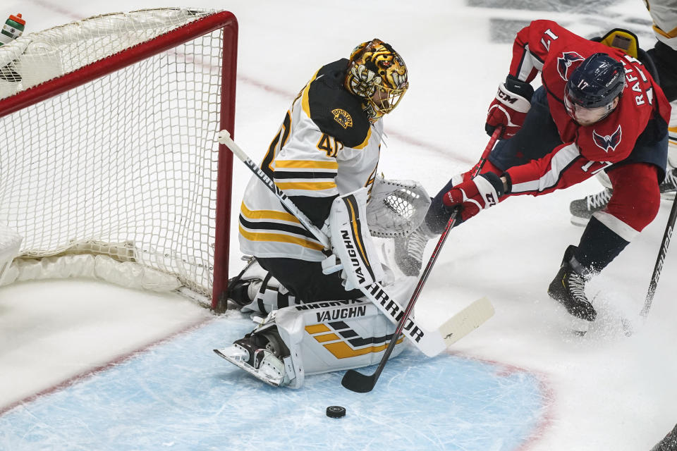 Washington Capitals left wing Michael Raffl (17) can't get the puck past Boston Bruins goaltender Tuukka Rask (40) during the first period of Game 2 of an NHL hockey Stanley Cup first-round playoff series Monday, May 17, 2021, in Washington. (AP Photo/Alex Brandon)