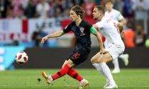 The influential Luka Modric keeps Jordan Henderson at bay during Croatia’s win over England in the World Cup semi-final in Russia.