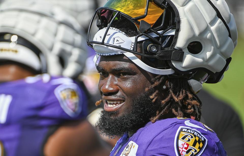 Baltimore Ravens linebacker David Ojabo looks on during a joint NFL football practice with the Washington Commanders, Tuesday, Aug. 15, 2023, in Owings Mills, Md. (Kevin Richardson/The Baltimore Sun via AP)