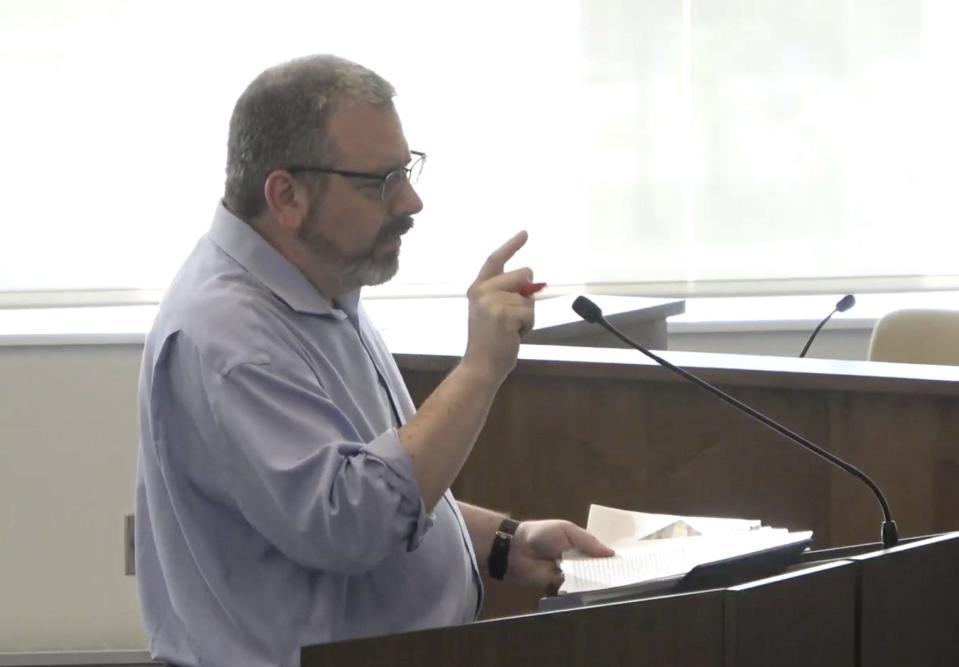 Ken Prince, director of planning and community development with the city of Mishawaka, speaks Thursday to the Common Council about the plans for The Mill Phase II apartment complex proposed for the Ironworks Plaza in downtown Mishawaka.