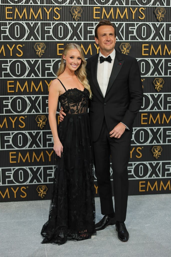 (L-R) Kayla Radomski and Jason Segel attend the 75th Primetime Emmy Awards at Peacock Theater on January 15, 2024 in Los Angeles, California.