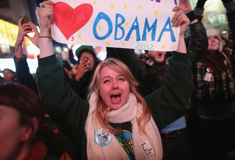 Jessica Clark celebrates with others in Times Square on November 6, 2012 in New York City. Clark said she voted for the first time in Tuesday's election. According to network projections incumbent U.S. President Barack Obama has won a second term. (Photo by John Moore/Getty Images)