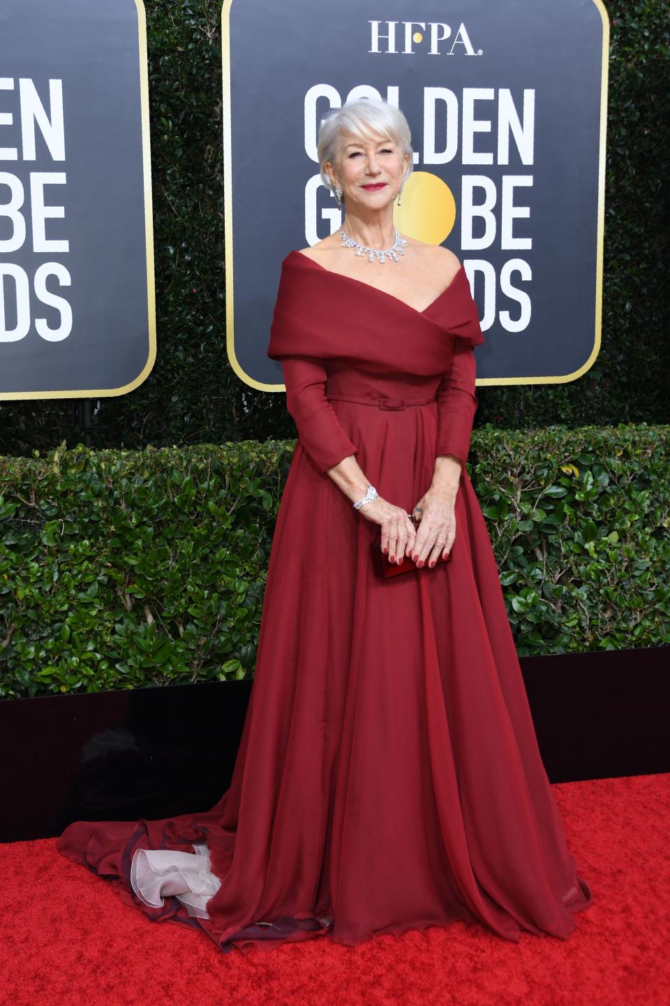 Helen Mirren in a red Dior Haute Couture gown at the 2020 Golden Globe Awards. (Image via Getty Images)