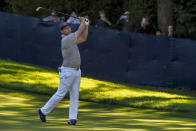 Bryson DeChambeau, of the United States, plays a shot on the 15th hole during the final round of the US Open Golf Championship, Sunday, Sept. 20, 2020, in Mamaroneck, N.Y. (AP Photo/John Minchillo)