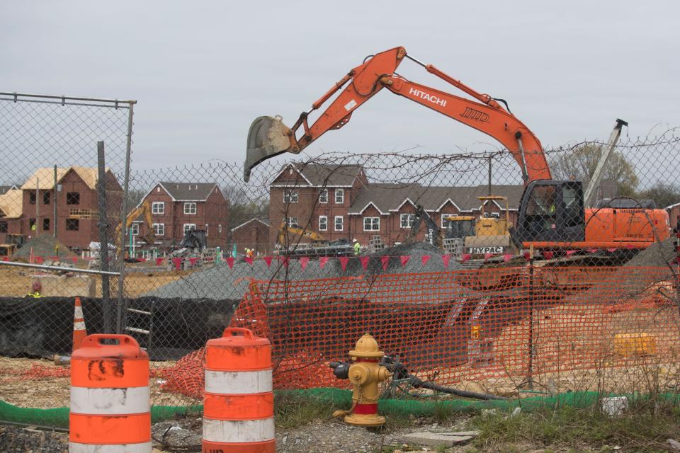 Construction continues on new affordable housing as part of the Reach Riverside improvements to the neighborhood Monday, April 25, 2022.  