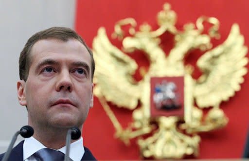 Dmitry Medvedev speaks at the Russian State Duma's extraordinary plenary session. Russia's new President Vladimir Putin on Tuesday won parliamentary approval for his predecessor Medvedev to become prime minister, as protesters tried new tactics to keep up pressure on the Kremlin