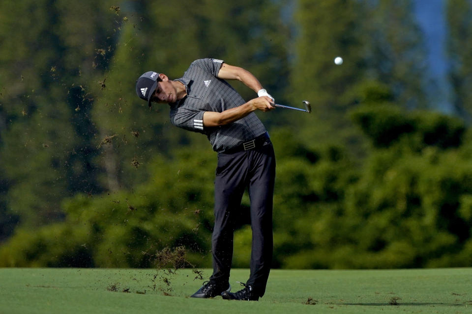 Joaquin Niemann hits from the fourth fairway during second round of the Tournament of Champions golf event, Friday, Jan. 3, 2020, at Kapalua Plantation Course in Kapalua, Hawaii. (AP Photo/Matt York)