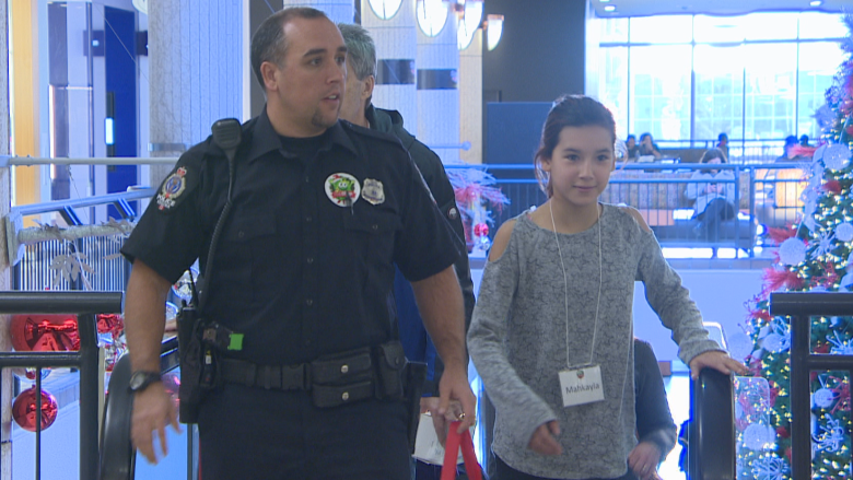 Regina cops-turned-elves take 20 elementary schoolkids Christmas shopping