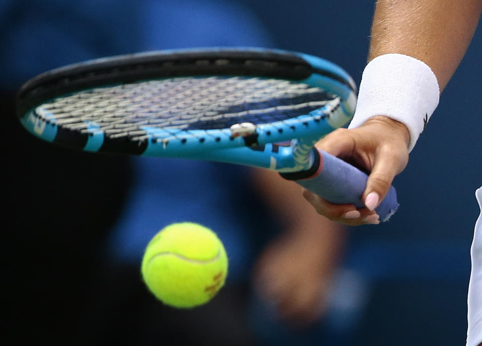 Dominika Cibulkova, of Slovakia, prepares to serve to Angelique Kerber, of Germany, during the third round of the U.S. Open tennis tournament, Saturday, Sept. 1, 2018, in New York. (AP Photo/Andres Kudacki)