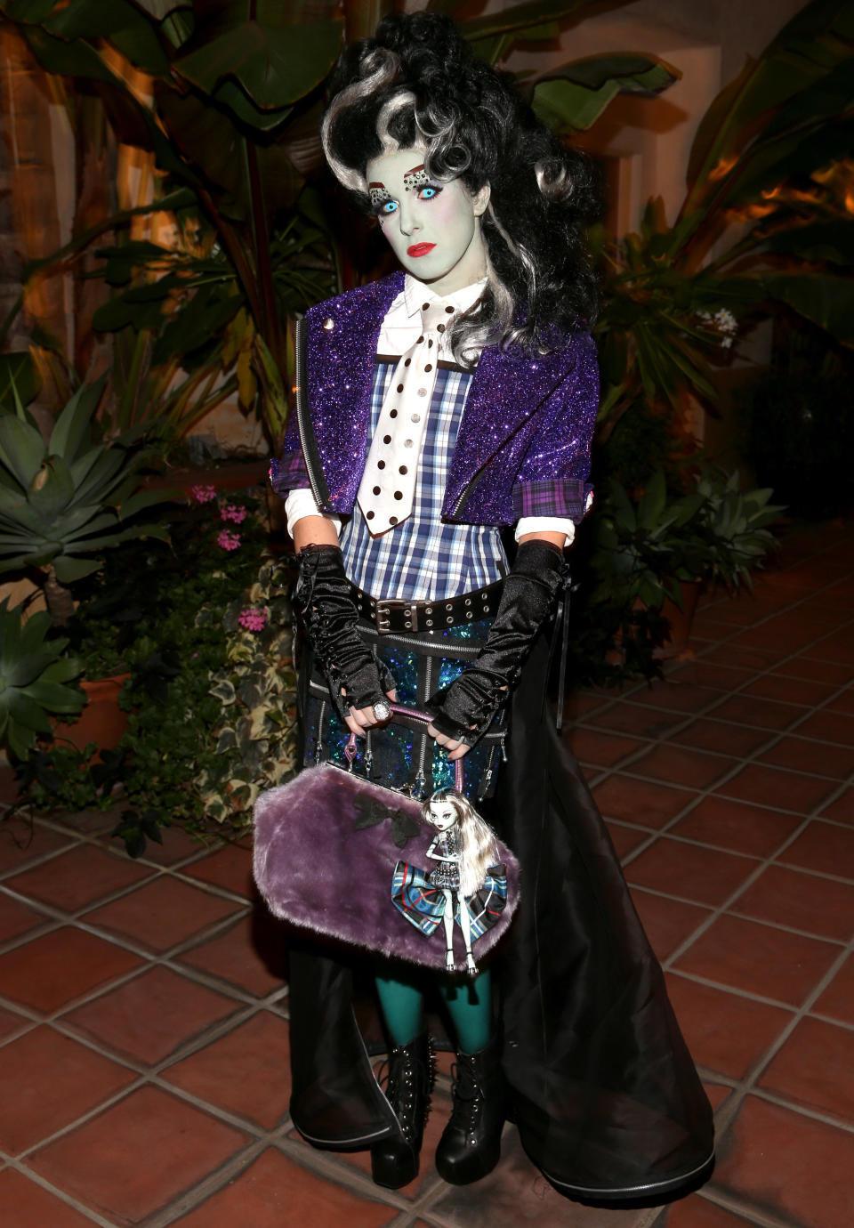 LOS ANGELES, CA - OCTOBER 28:  90210 starlet, Shenae Grimes, dressed as Monster High's Frankie Stein, leaves for Matthew Morrison's 3rd Annual Halloween Party on October 28, 2012 in Los Angeles, California.  (Photo by Christopher Polk/Getty Images for Mattel)