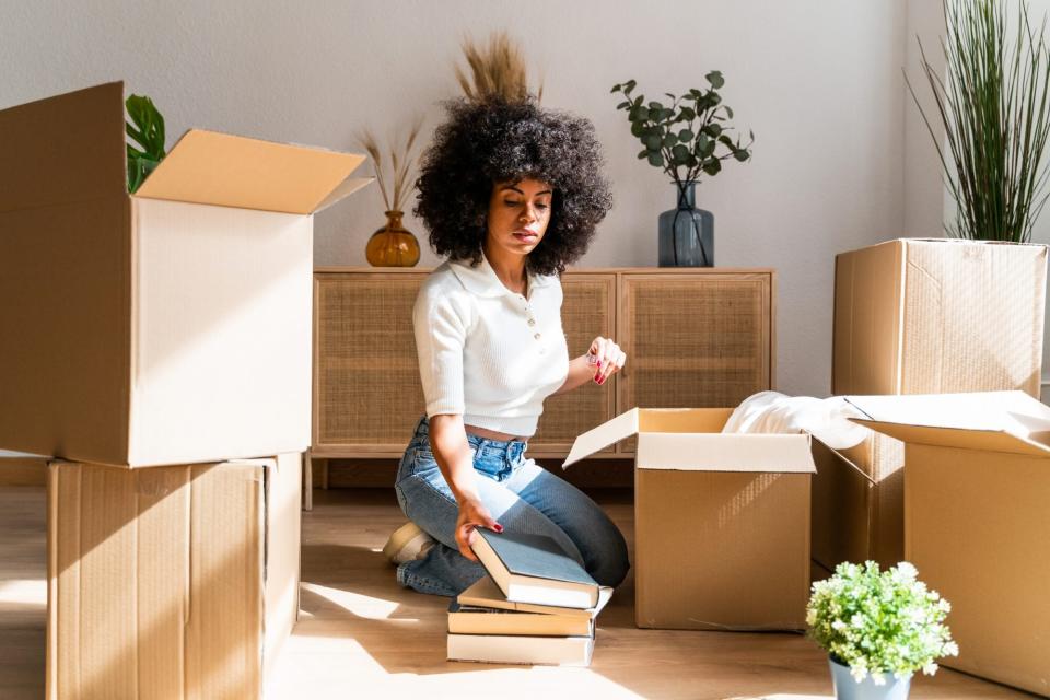 woman organizing books