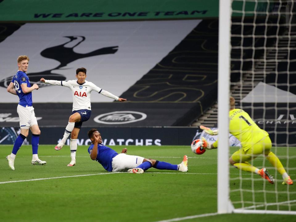 Son fires at goal as Pickford dives to make a save: Getty